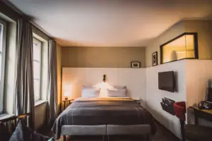 Bed Bed in a stylishly furnished room.