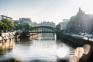 Canal in Hamburg's Speicherstadt warehouse district Bridge over canal in Hamburg's Speicherstadt