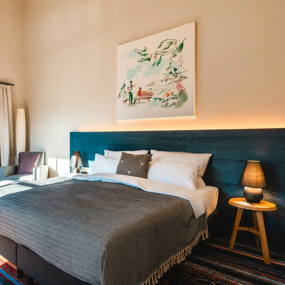 Bed Bed in a stylishly furnished bedroom with pillows and bed linen.