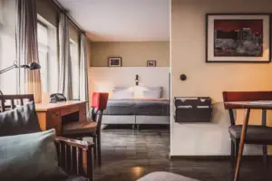 Bedroom A room with a bed and a desk.