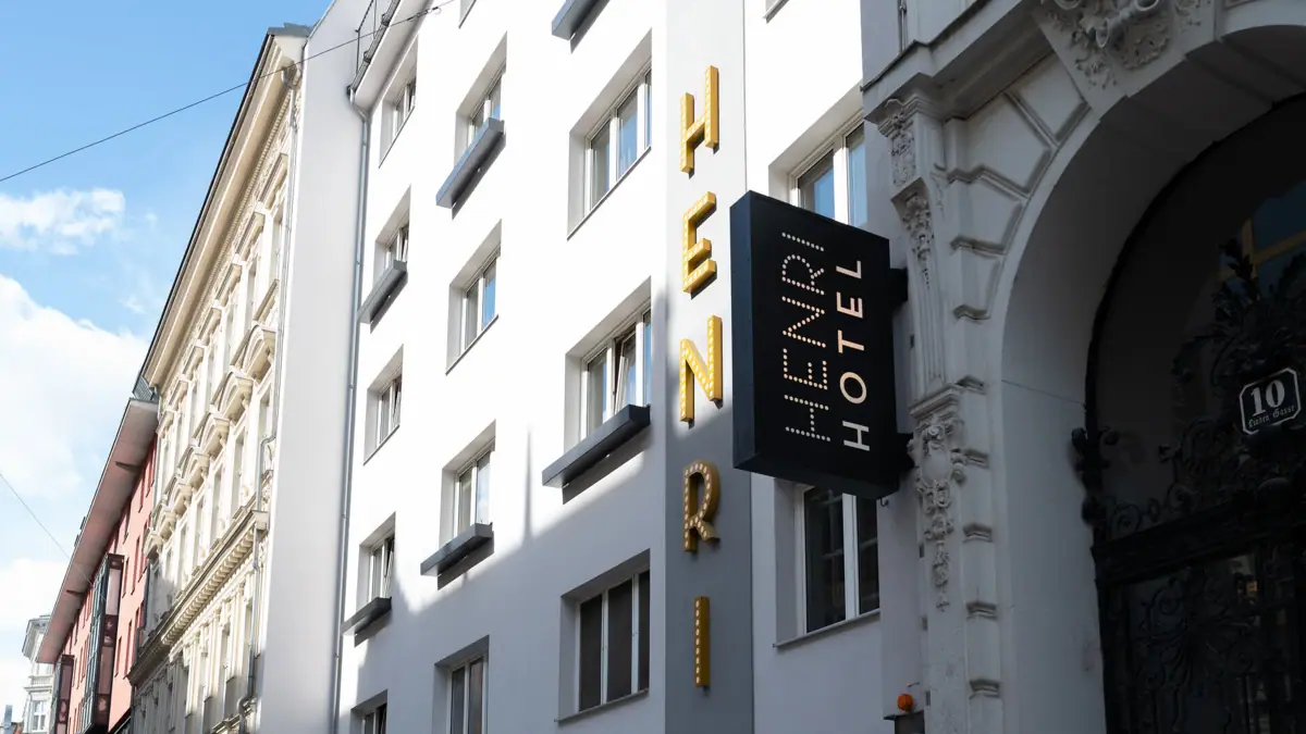 HENRI Vienna A sign on a building.