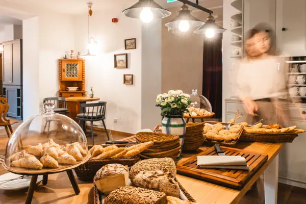 Bread and rolls A table with snacks and pastries.