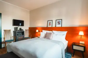 Bed Bed with white ceiling and red headboard
