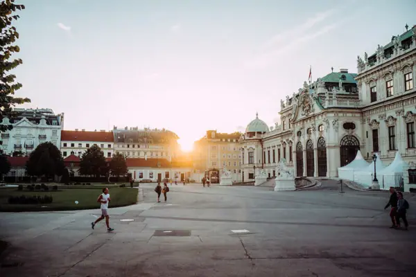 Vienna A person is walking in a courtyard.