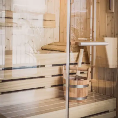 Sauna at HENRI Düsseldorf Wooden bucket in a sauna