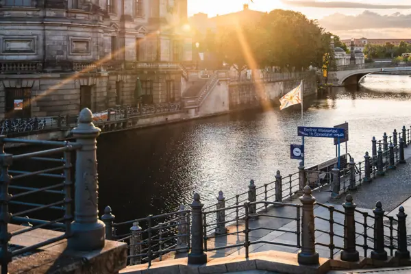 Berlin water channel A building next to a river.