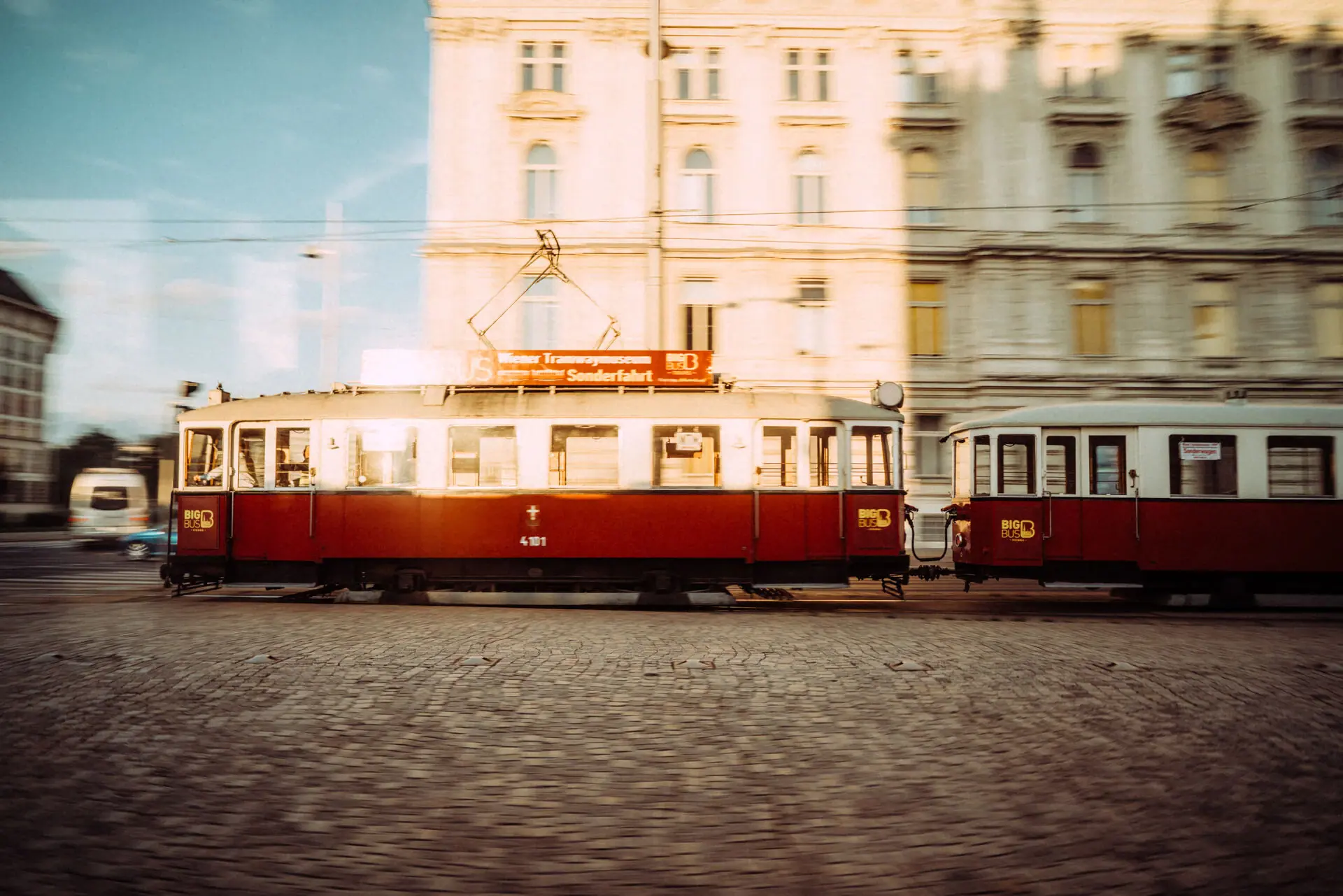 Tramway Red and white tram on a road