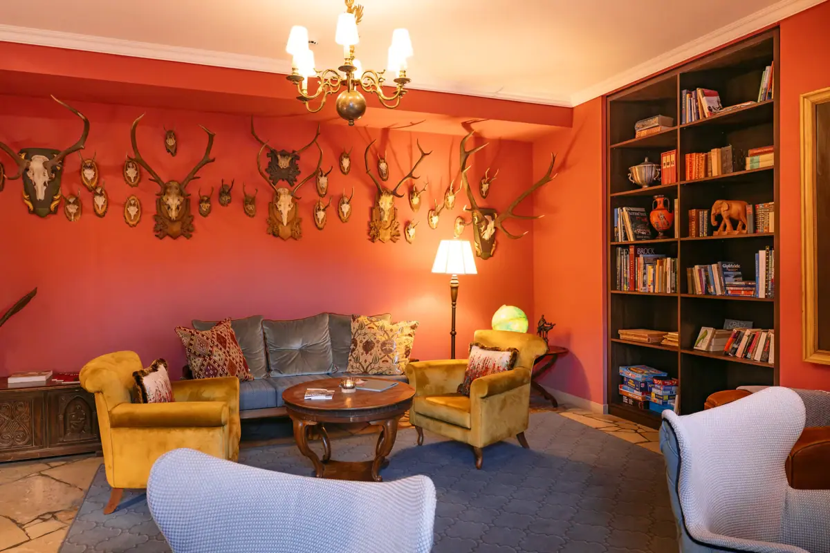 Lounge A room with a sofa and chairs.