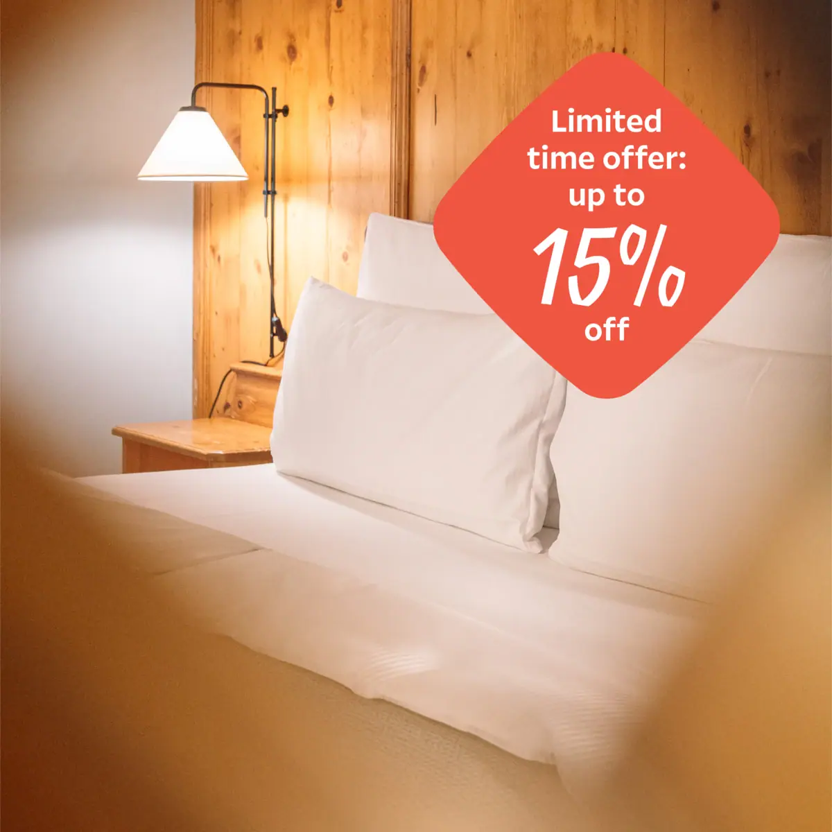 Autumn Special A bed with white pillows and a lampshade.