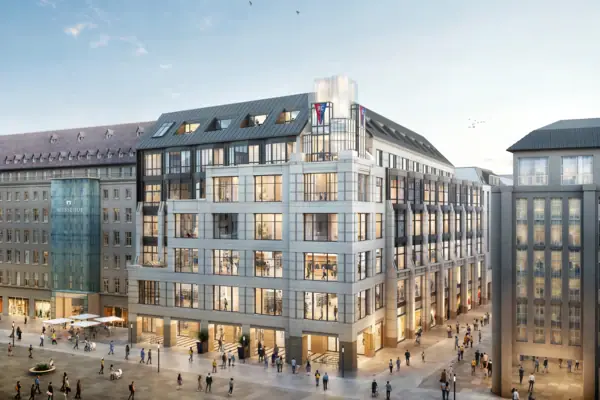 HENRI Hotel Leipzig exterior view A group of people walk around the future HENRI Hotel in Leipzig.