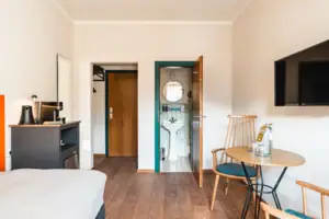 Room view A room with washbasin and mirror.