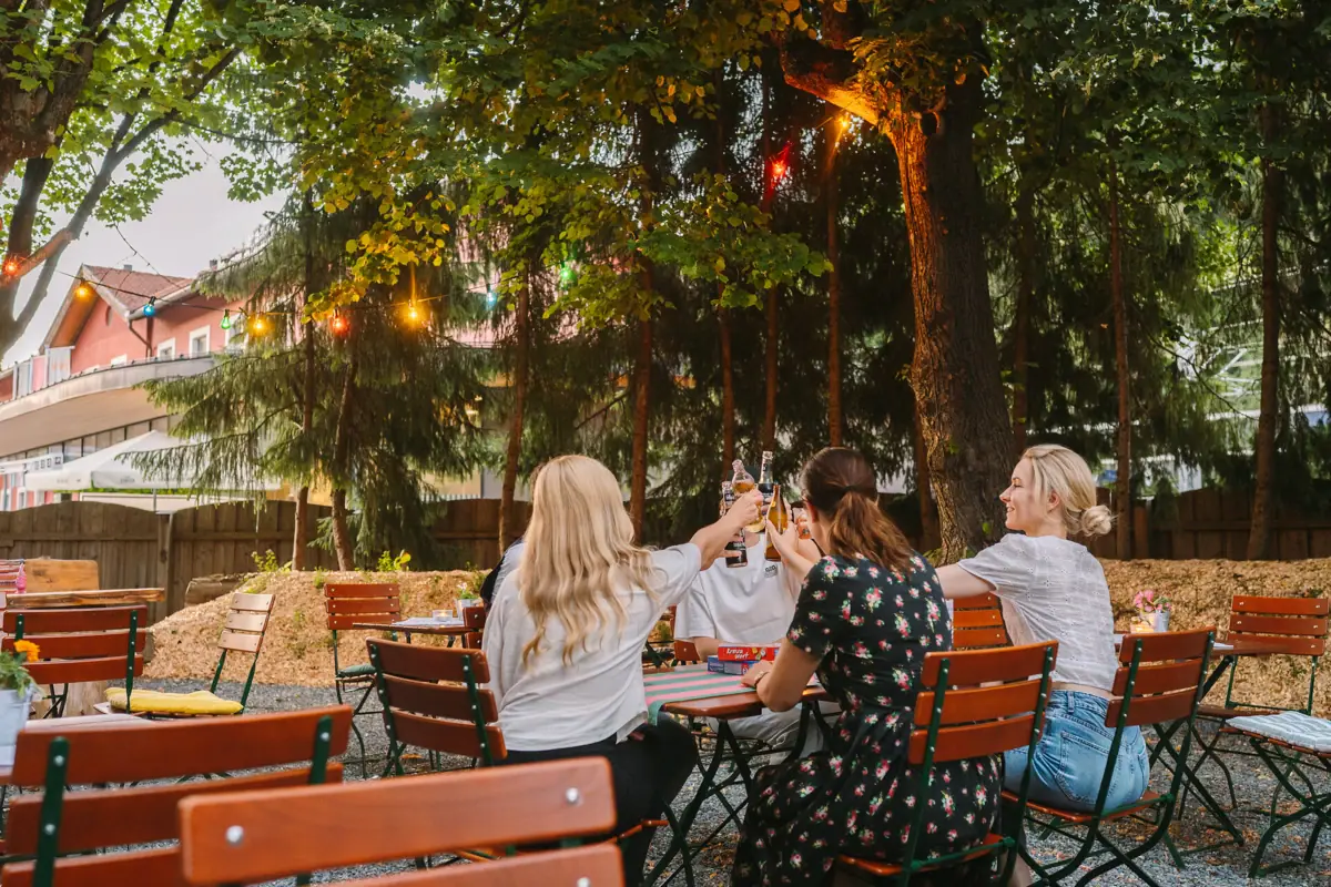 Terrace A group of women sit at a table with drinks.