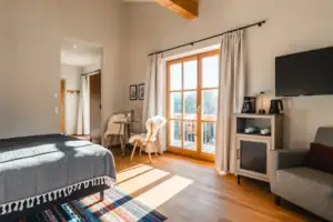 Room view Bedroom with a television and a bed.