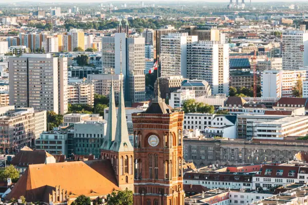 Berlin Centre Large city with a clock tower in the foreground.