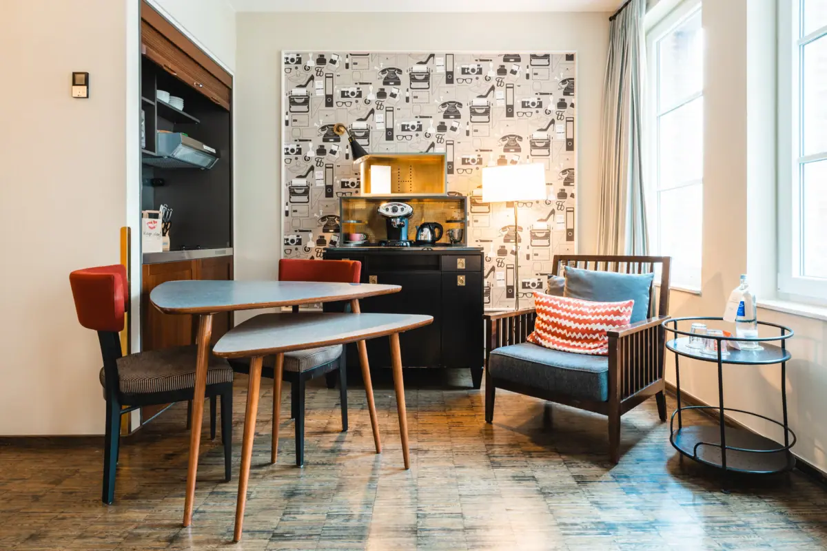 Dining table and armchair in the room A room with a table and chairs.