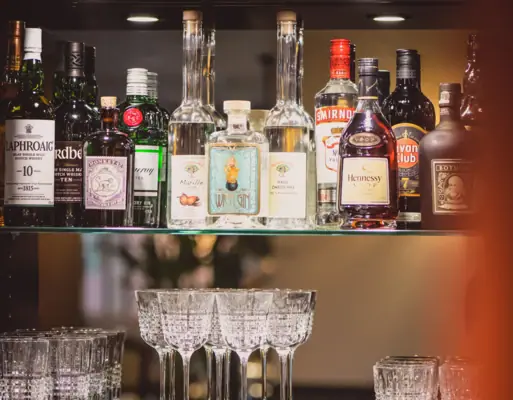 Bar Shelf with glasses and alcohol bottles