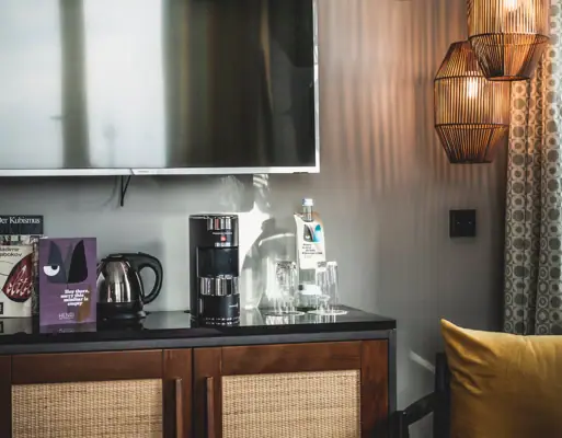 Tea & coffee station A television on a wall.