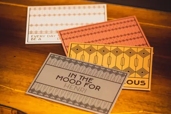 Postcards A group of cards on a table.