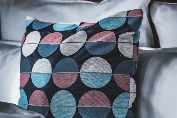 Pillows on a bed Cushion with graphic pattern