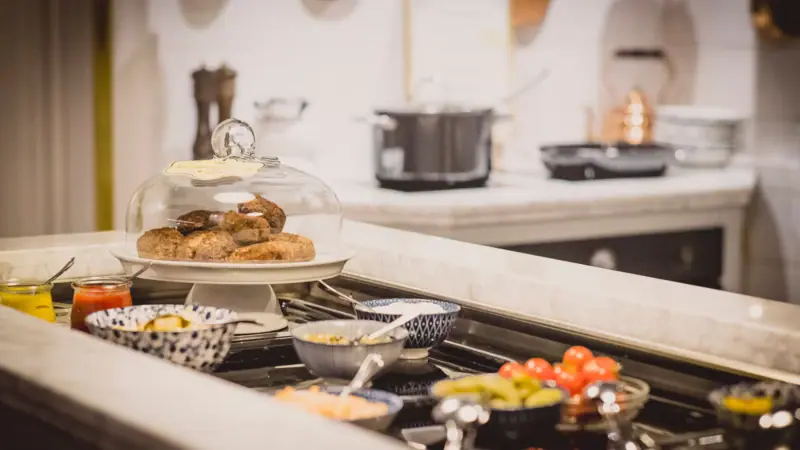 HENRI Berlin Evening meal A counter with food on it.