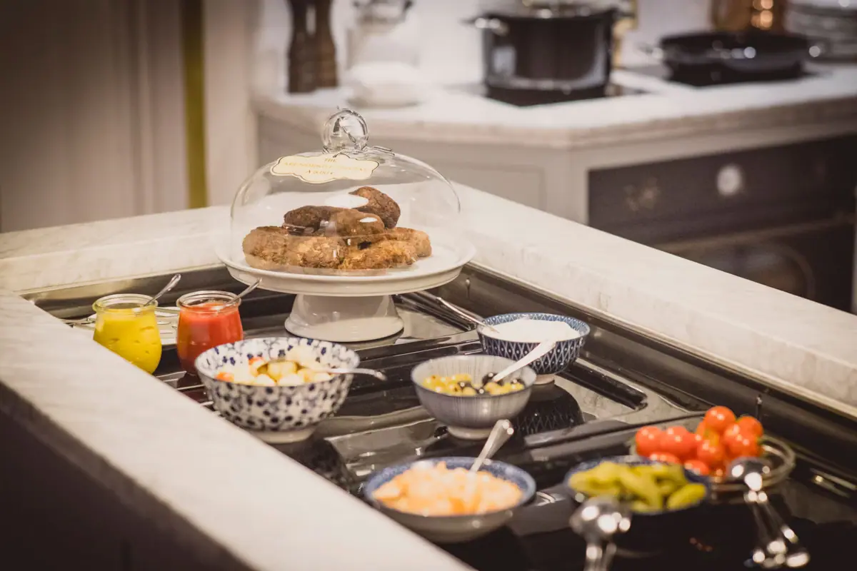 HENRI Berlin Evening meal A table with various dishes on it.