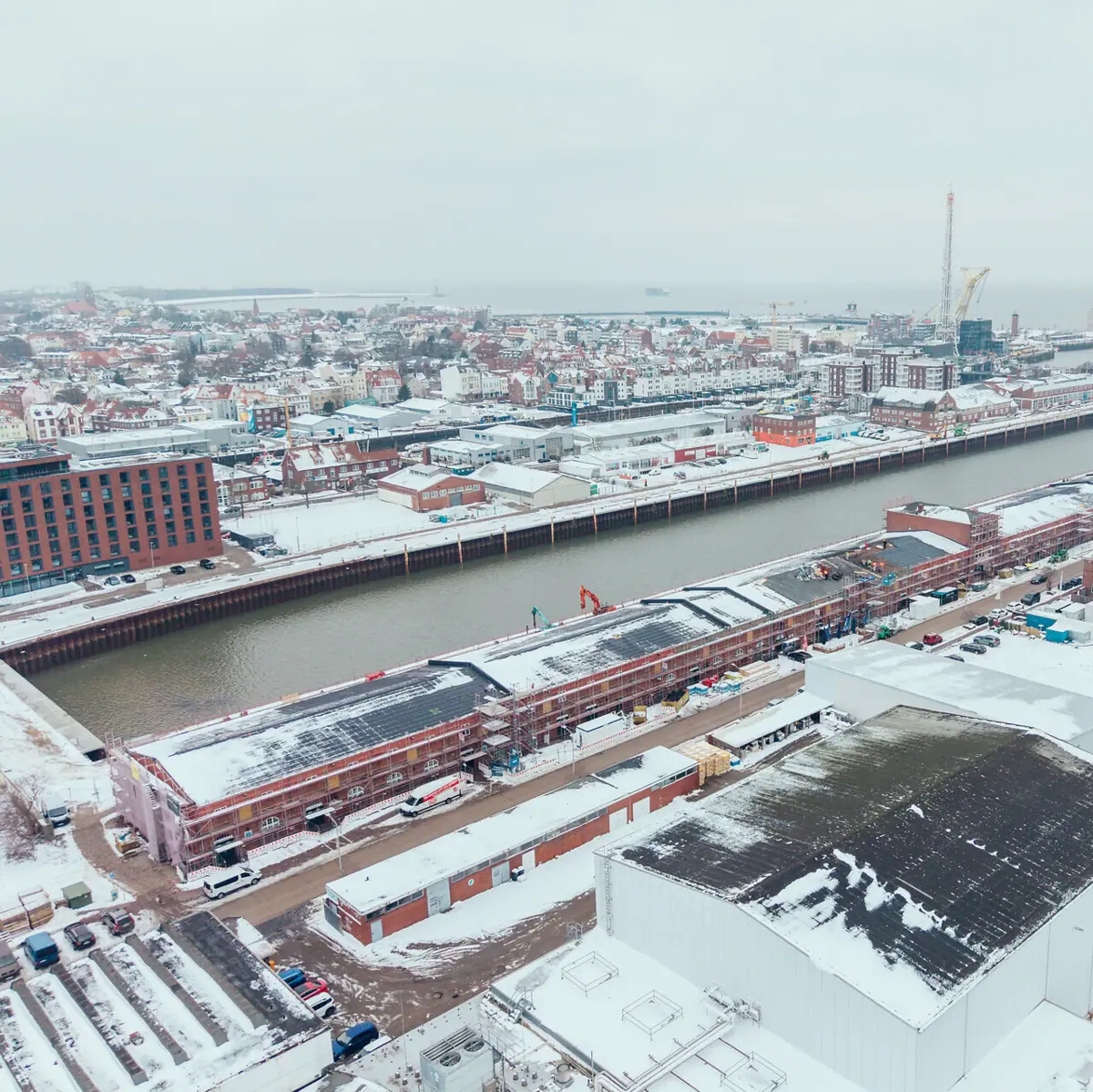 Aerial view of Cuxhaven fishing harbour An aerial view of the fishing harbour in Cuxhaven in winter with snow.