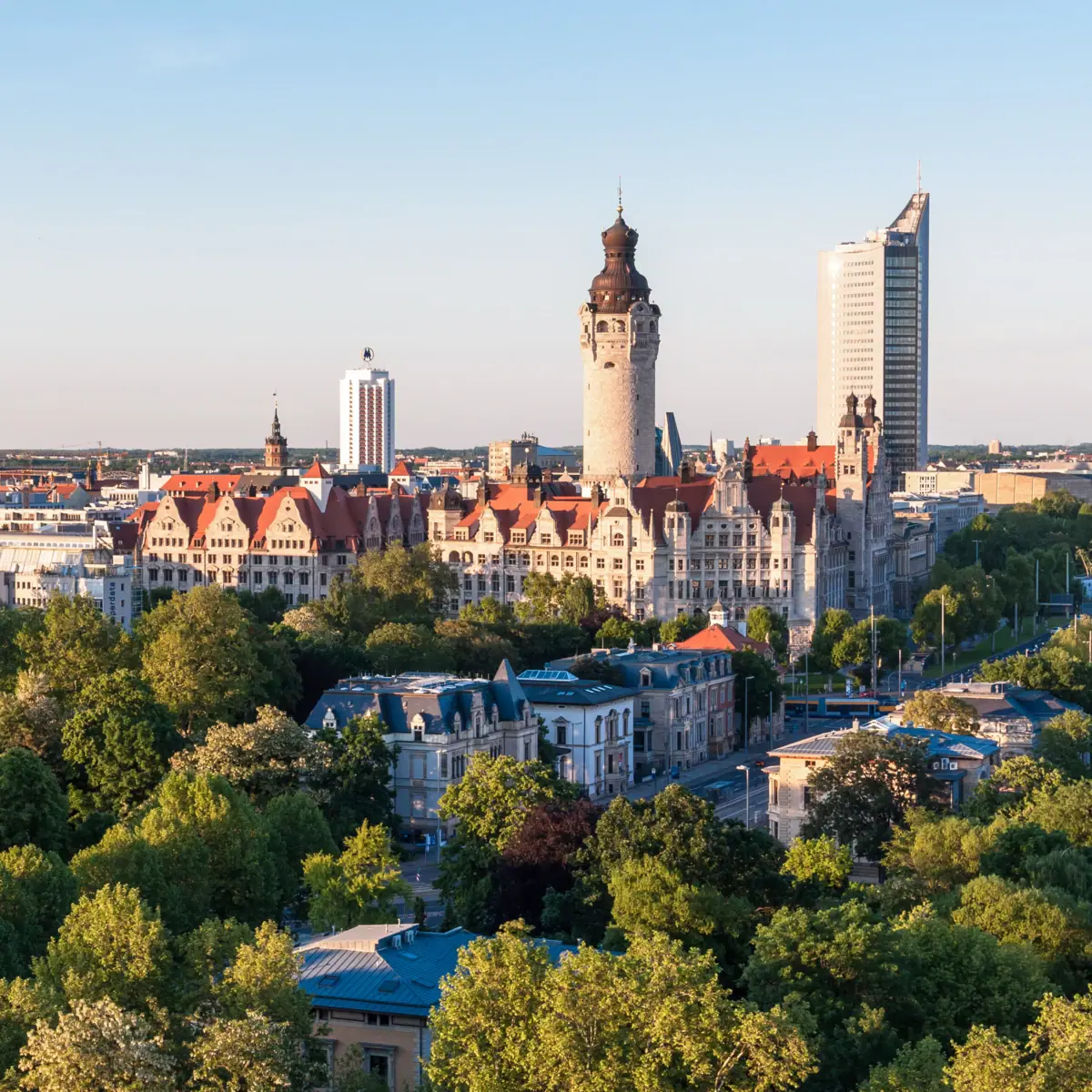 Leipzig Skyline The Leipzig skyline with trees and buildings in the morning light.