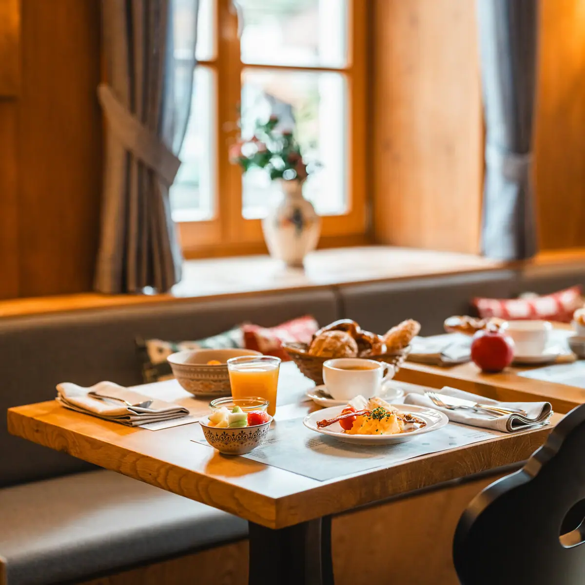Breakfast at the HENRI Kitzbühel A table with breakfast on it.