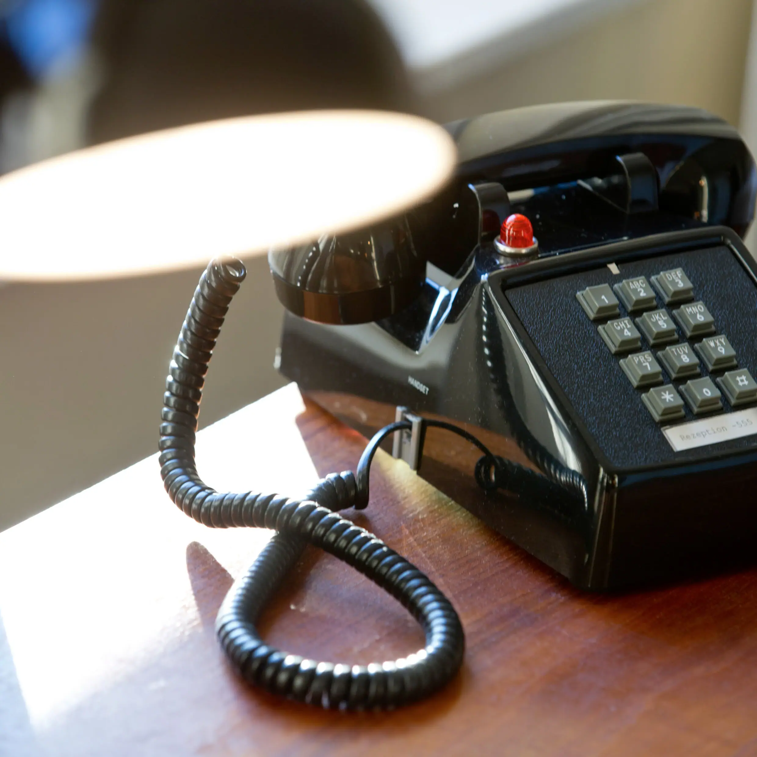 Telephone on a small table Retro telephone on a small table