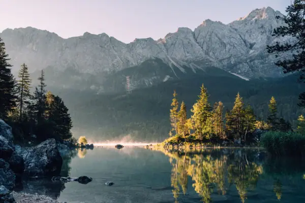 Eibsee with mountain panorama The Eibsee with trees and mountains in the background near Garmisch-Partenkirchen.