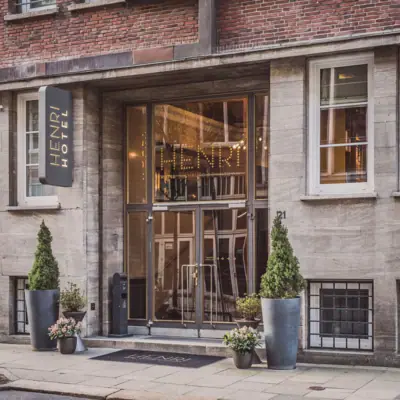 Entrance to the HENRI Hotel Hamburg Entrance to the HENRI Hotel Hamburg with two planters