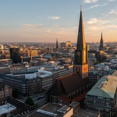 Hamburg from above Town view with high church tower in the foreground.