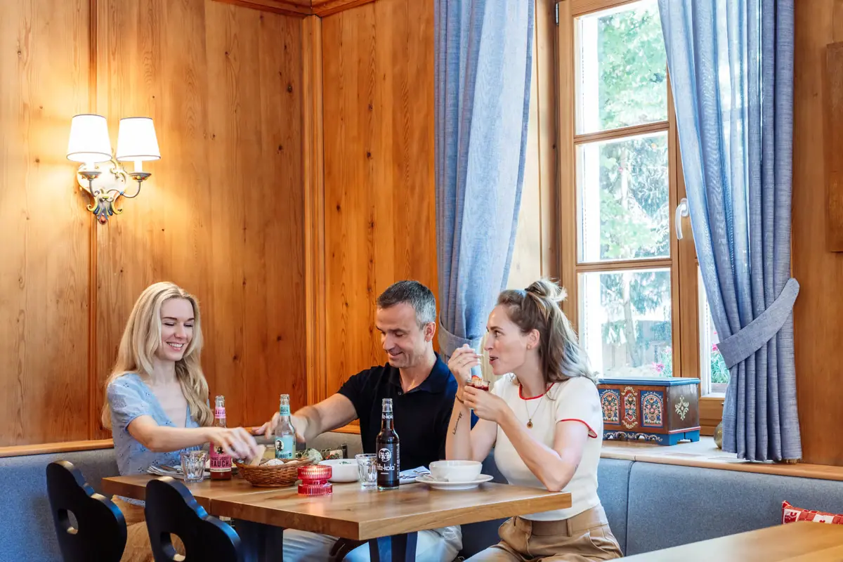 Get-together A group of people are sitting at a table.