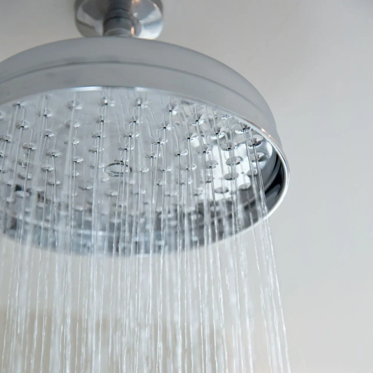 Large silver shower head Shower head with running water