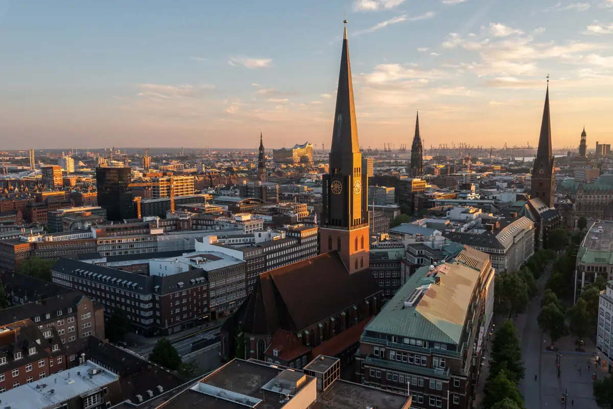 St Jacobi Church Hamburg City view with high church tower and slightly cloudy sky.