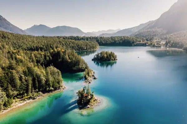 Eibsee Bavaria Lake with clear blue water and green fir trees